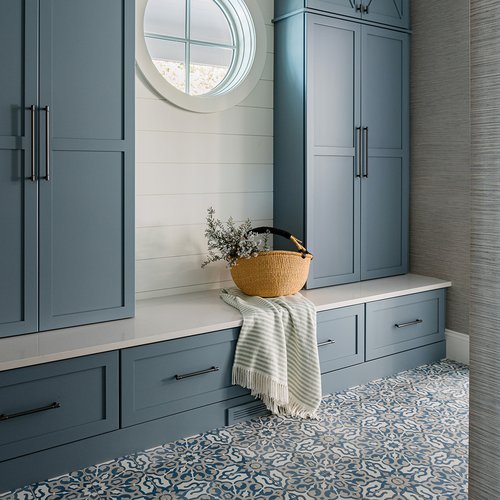 Modern mud room with slate blue cabinetry in Holland, MI