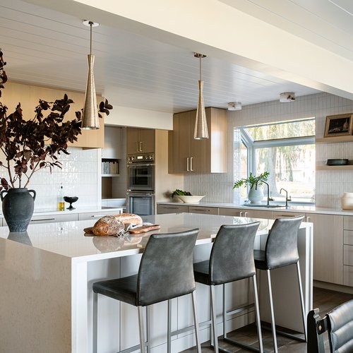 Stylish kitchen with a white countertop island in Holland, MI