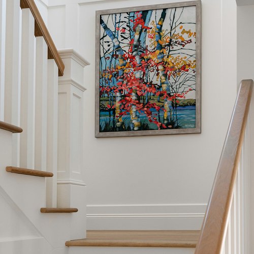 Bright open stairwell with hardwood flooring by Michigan Tile Inc